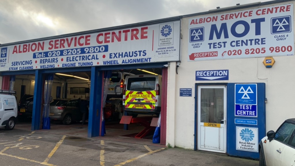 Albion Service Centre on Kingsbury Road, open bays, MOT signs and reception